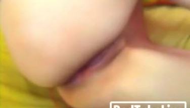 Young brunette masturbates and fists